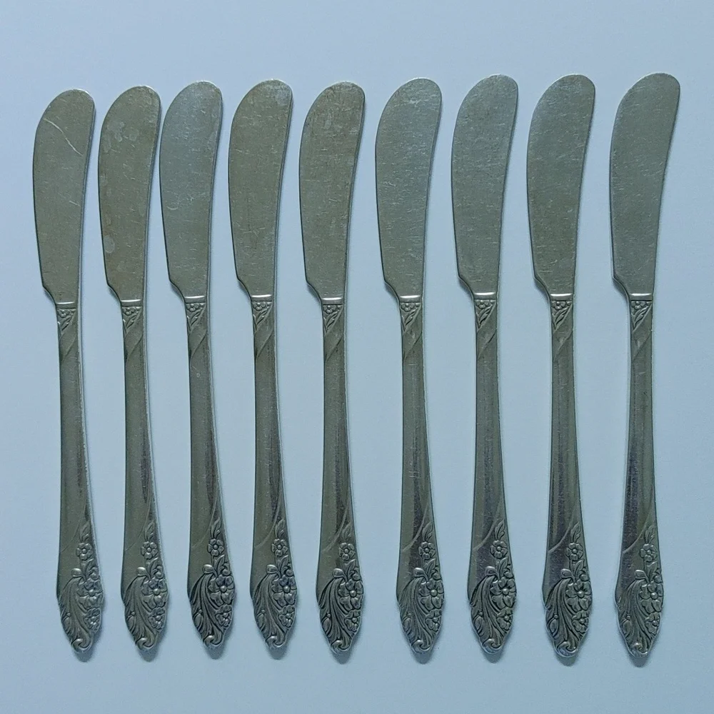 Oneida Evening Star Silver Plate Butter Knives Lot of 9